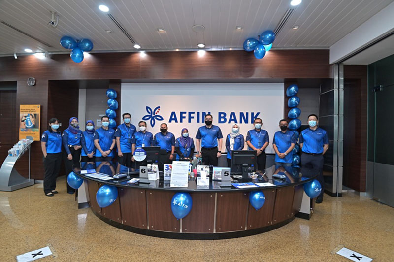 An AFFIN Bank team collaborating on strategies for responsible and sustainable banking.